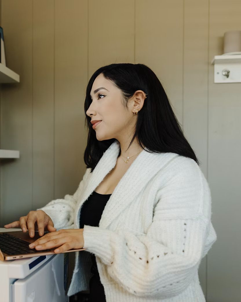 A business owner working on a laptop